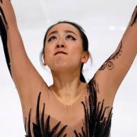 Mao Asada competes at the ISU Grand Prix of Figure Skating Trophee de France in November. Three-time world champion Mao Asada brings an end to illustrious career