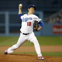 Los Angeles starting pitcher Kenta Maeda delivers during the Dodgers’ 4-0 loss to the Padres on Tuesday. Maeda, Iwakuma fall in first outings of 2017