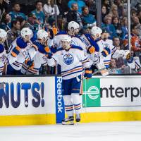 The Oilers’ Anton Slepyshev celebrates with the bench after scoring in Game 6 on Saturday. Upstart Oilers eliminate Sharks
