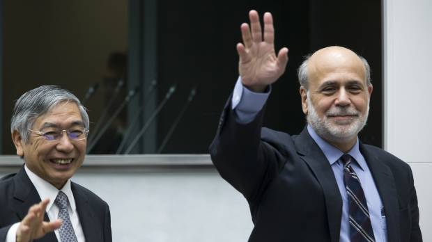 Bank of Japan Gov. Haruhiko Kuroda and Ben Bernanke, former chairman of the U.S. Federal Reserve, wave during the 2017 BOJ-IMEF Conference at the Bank of Japan headquarters in Tokyo on Wednesday. Former Fed chief Bernanke endorses BOJ's inflation goal