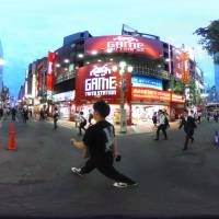 Pedestrians walk through a shopping area in the Shinjuku area of Tokyo on Wednesday. Image was created as an Equirectangular Panorama to create an interactive 360 degree view. Consumer prices rise in April for fourth month lifted by energy, fresh food