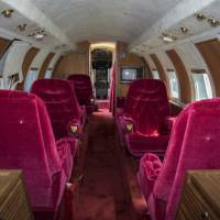 Elvis Presley designed the jet’s interior, featuring red velvet seats and red shag carpet. Elvis’ red velvet private jet up for auction