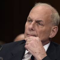 Homeland Security Secretary John Kelly listens on Capitol Hill in Washington Thursday while testifying before a Senate Appropriations subcommittee on the fiscal 2018 budget. Kelly said he’s considering banning laptops from the passenger cabins of all international flights to and from the United States. Kelly says U.S. may expand laptop carry-on ban to all international flights