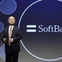 SoftBank founder Masayoshi Son, seen here at a February news conference in Tokyo, has almost $100 billion to invest in making the next big thing a reality. SoftBank's Son chases boyhood dreams with $100 billion fund