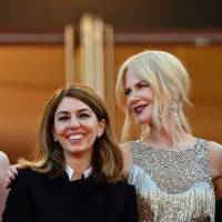 Actress Elle Fanning, director Sofia Coppola and actress Nicole Kidman smile as they arrive on May 24 for the screening of the film “The Beguiled” at the 70th edition of the Cannes Film Festival. Sofia Coppola wins best director at Cannes film festival