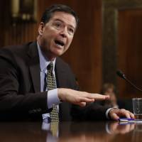 FBI Director James Comey testifies on Capitol Hill in Washington Wednesday before the Senate Judiciary Committee hearing: “Oversight of the Federal Bureau of Investigation.” Comey testifies he felt 'nauseous' at thought he swayed U.S. election against Clinton