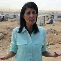 U.S. Ambassador to the United Nations Nikki Haley speaks to journalists during a visit to the Zaatari Refugee Camp, Jordan, Sunday. At odds with Trump, envoy Haley vows more aid for Syrians during visit to Jordan refugee camp