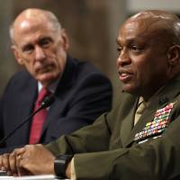 Defense Intelligence Agency Director Lt. Gen. Vincent Stewart, accompanied by Director of National Intelligence Dan Coats, testifies on Capitol Hill in Washington Tuesday before the Senate Armed Services Committee hearing on worldwide threats. North Korea, if left unchecked, on 'inevitable' path to nuclear ICBM: U.S. general