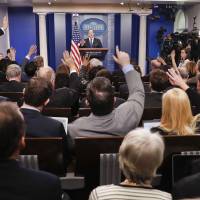 Reporters raise their hands in February as White House press secretary Sean Spicer takes questions during the daily briefing in the Brady Press Briefing Room of the White House in Washington. While Americans have doubts about how much they should trust the “news media” in general, a poll by the Media Insight Project released Wednesday suggests they have a higher opinion of the sources they personally rely upon to follow the world. Poll finds Americans have doubts about 'news media' but trust their favorites