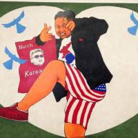 A painting by North Korean defector Song Byeok is displayed at his first U.K. exhibition in London on Tuesday. Ex-North Korean propaganda artist turns his skills to satire