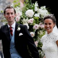 Pippa Middleton and James Matthews smile following their wedding ceremony on Saturday at St. Mark’s Church in Englefield, England. Pippa Middleton, sister of Kate, Duchess of Cambridge, marries with two likely future kings in attendance