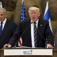 U.S. President Donald Trump gives a speech at the Yad Vashem Holocaust Museum in Jerusalem Tuesday. Trump pushed for an elusive peace between Israel and the Palestinians, calling on both sides to put aside the ‘pain and disagreements of the past.’ Trump appeals to Israelis, Palestinians to find peace but offers no path forward