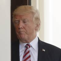U.S. President Donald Trump walks back into the White House in Washington after seeing off Turkish President Recep Tayyip Erdogan following Erdogan’s visit Tuesday. Trump alleged sharing of secrets with Moscow puts intelligence relations at risk: experts