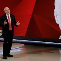 Labour leader Jeremy Corbyn answers questions from the studio audience during a joint Channel 4 and Sky News general election program recorded at Sky studios in Osterley, west London, Monday. Live TV interview hurls hard questions at Theresa May, Jeremy Corbyn ahead of polls