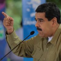 Venezuelan President Nicolas Maduro speaks during his weekly broadcast “Los Domingos con Maduro” (“The Sundays with Maduro”) in Caracas Sunday. Activist, 20, latest killed in Venezuela protest violence as death toll hits 60