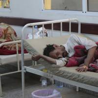 People are treated for suspected cholera infection at a hospital in Sanaa Monda. The U.N. humanitarian coordinator in Yemen says a cholera outbreak has killed 115 people over the past two weeks. Rebels in famine-hit Yemen declare emergency as cholera deaths top 180, more cases surging