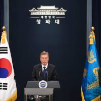 South Korea’s new President Moon Jae-in (left) speaks as prime ministerial nominee Lee Nak-yeon listens during a news conference at the presidential Blue House in Seoul on Wednesday. Moon win puts allies' approach to North Korea in doubt, but drastic policy shift unlikely, experts say