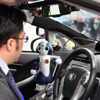 A survey showed elderly drivers preferred advice from robots over spouses or friends. Nagoya team working on robot to help elderly drivers stay alert, safe