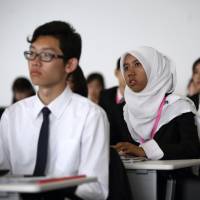 Students from Asian countries participate in a job fair in Tokyo in hopes of high-paying employment opportunities after graduation. Japan using education to add influence, tap into booming Southeast Asia markets