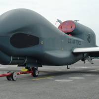 A Global Hawk surveillance drone temporarily deployed to the U.S. military’s Yokota Air Base in western Tokyo is shown to media Wednesday. In message to North Korea, U.S. military shows off massive surveillance drone