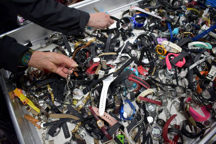 Watches are among items on sale at a secondhand market of unclaimed goods in Saikaya department store in Fujisawa, Kanagawa Prefecture, in April.