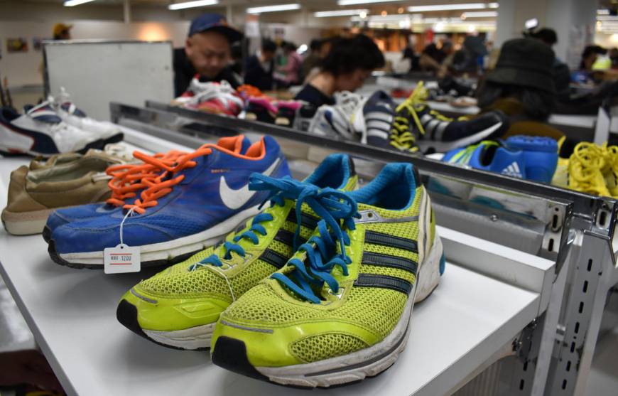 Shoes are among items on sale at a secondhand market of unclaimed goods in Saikaya department store in Fujisawa, Kanagawa Prefecture, in April.