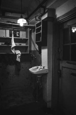 A room in a freshly vacated apartment.