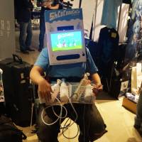 Living in a box: Flash Games Japan finds an unusual way to promote its “ShCoCoooCoCo” game. Unusual controllers preside at BitSummit