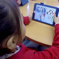 Early start: Children at the Seisen International School in Tokyo complete a drawing assignment on iPads. Liberating young minds with technology