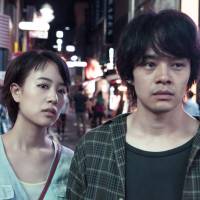Take to the sky: Shizuka Ishibashi (left) and Sosuke Ikematsu endure Tokyo’s grit. The Tokyo Night Sky Is Always the Densest Shade of Blue