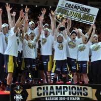 The Tochigi Brex celebrate following their 85-79 victory over the Kawasaki Brave Thunders in the inaugural B. League final at Yoyogi National Gymnasium on Saturday afternoon. Brex claim first B. League title