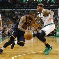 Cleveland’s Kyrie Irving drives on Boston’s Isaiah Thomas in the first half in Game 2 on Friday night. Cavs send Celtics to record loss