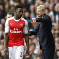 Arsenal manager Arsene Wenger, seen speaking to Danny Welbeck before he entered a match as a substitute in April, has been at the helm since 1996. Wenger admits his uncertain status has affected Arsenal