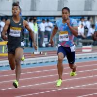 Justin Gatlin (right) leads the field, including Aska Cambridge and Abdul Hakim Sani Brown, in the men’s 100-meter race at the Golden Grand Prix meet in Kawasaki on Sunday. Gatlin outruns Cambridge, Sani Brown for 100-meter victory at Golden Grand Prix Kawasaki