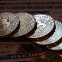 The euphoria over bitcoin reached a fever pitch last week, but its slow transaction times and inertia are helping to prevent widespread usage. As bitcoin price surges, greater usage remains in question