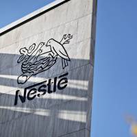 Nestle’s birds nest logo is seen carved on a building at the firm’s headquarters in Vevey, Switzerland. Activist investor Dan Loeb’s hedge fund Third Point is targeting the firm. Activist hedge fund Third Point buys $3.5 billion stake in Nestle, eyeing opportunities in Europe