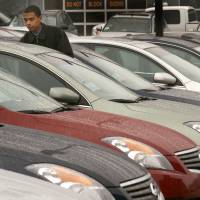 Nissan’s Altima sedans are seen on a sales lot in Midlothian, Virginia. Nissan expands sales to rental companies, but analysts warn of risk