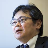 Naohiko Baba, chief Japan economist at Goldman Sachs Group Inc., speaks during an interview in Tokyo on Wednesday. Goldman Sachs economist urges crackdown on unpaid overtime to boost Japan's productivity