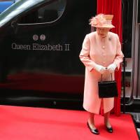 Britain’s Queen Elizabeth II attends a ceremony at Paddington Station in London on Tuesday after taking a test ride on a new high-speed intercity train made by Hitachi Ltd. Britain's Queen Elizabeth II enjoys test ride on Hitachi-made high-speed train in London