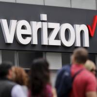 Verizon corporate signage is captured on a store in Manhattan’s Midtown area in New York May 2. On Tuesday, Verizon took over Yahoo, completing a $4.5 billion deal that will usher in a new management team to attempt to wring more advertising revenue from one of the internet’s best-known brands. Verizon completes $4.5 billion takeover of Yahoo
