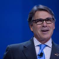 Rick Perry, U.S. secretary of energy, speaks during the SelectUSA Investment Summit in Oxon Hill, Maryland, Monday. Perry snubs mainstream science, sides with Pruitt in saying carbon dioxide not prime driver of warming