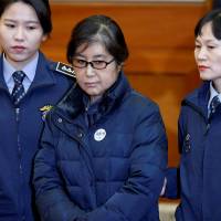 Choi Soon-sil arrives for a hearing in then-South Korean President Park Geun-hye’s impeachment trial at the Constitutional Court in Seoul on Jan. 16. Friend of ousted South Korean president gets 3 years in prison