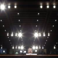 Former FBI Director James Comey speaks during a Senate Intelligence Committee hearing on Thursday. Comey's release of Trump memo to newspaper: Was it legal?