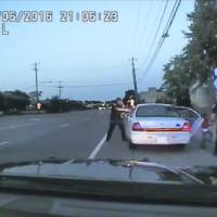 Video captured by the squad car camera of St. Anthony Police officer Jeronimo Yanez last July shows him after he shot into the vehicle at Philando Castile during a traffic stop in Falcon Heights, Minnesota, and as the 4-year-old daughter of Castile’s girlfriend, Diamond Reynolds, starts to get out of the car and is grabbed by an officer. Dashcam video shows traffic stop escalating, Minnesota officer firing seven rounds into Castile's car