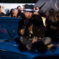 Johnny Depp arrives to introduce his film “The Libertine” at the outdoor cinema venue Cineramageddon at the Glastonbury Festival of Music and Performing Arts near the village of Pilton in Somerset, England, on Thursday. In latest drama of artists vs. Trump, Depp jokes of assassinating Trump, then apologizes