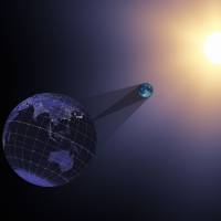This NASA handout visualization animation still image released Wednesday shows the Earth, moon and sun at 17:05:40 UTC during the eclipse. In the animation from which this still was taken, the Earth, moon, sun, and shadow cones are viewed through a telescopic lens on a virtual camera located far behind the Earth. Long focal lengths like the one used here appear to compress the distance between near and far objects. America to experience first coast-to-coast total solar eclipse since 1918 in August