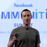 Facebook CEO Mark Zuckerberg speaks at the Facebook Communities Summit in Chicago on June 21. Facebook, doubling in size since 2012, now has 2 billion regular users