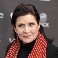 Carrie Fisher attends the 2011 NewNowNext Awards in Los Angeles. A coroner’s report released Monday shows that Fisher had cocaine, ecstasy and heroin in her system when she became ill on a London to Los Angeles flight in December. The reports states it is difficult to pinpoint when the drugs were taken and their impact on Fisher’s Dec. 27 death, which was caused by sleep apnea and other undetermined factors, Fisher’s autopsy report states. Carrie Fisher autopsy reveals cocaine, ecstasy, traces of heroin, alcohol