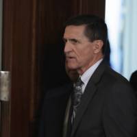 In this Feb. 13 file photo, then-National Security Adviser Michael Flynn is in the East Room of the White House in Washington. Two top House Democrats are questioning whether former Trump National Security Adviser Flynn failed to report a 2015 trip to the Middle East on his security clearance form, a potential omission that could add to the legal jeopardy Flynn faces over the truthfulness of his statements to federal authorities and on government documents. House Democrats suspect Flynn failed to disclose 2015 Mideast travel during security scrutiny