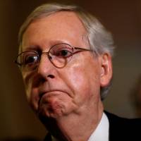 Senate Majority Leader Mitch McConnell speaks to the media about delaying a vote on Republican plans to repeal and replace Obamacare on Capitol Hill in Washington Tuesday. Senate GOP leaders delay vote to replace Obamacare amid defections